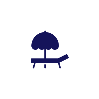 A blue bench under an umbrella on a black background